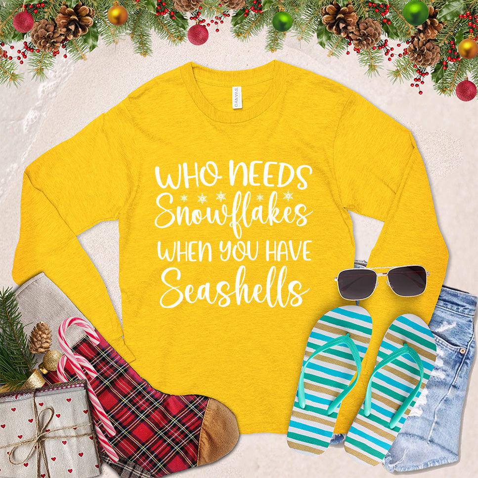 Who Needs Snowflakes When You Have Seashells Long Sleeves Gold - Long sleeve tee with "Who Needs Snowflakes When You Have Seashells" text, for beach-themed casual wear