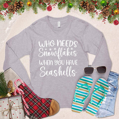 Who Needs Snowflakes When You Have Seashells Long Sleeves Storm - Long sleeve tee with "Who Needs Snowflakes When You Have Seashells" text, for beach-themed casual wear