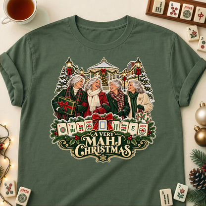 A Very Mahj Christmas mahjong T-shirt in Military Green, laid flat. [bb c=military-green r=flat]
