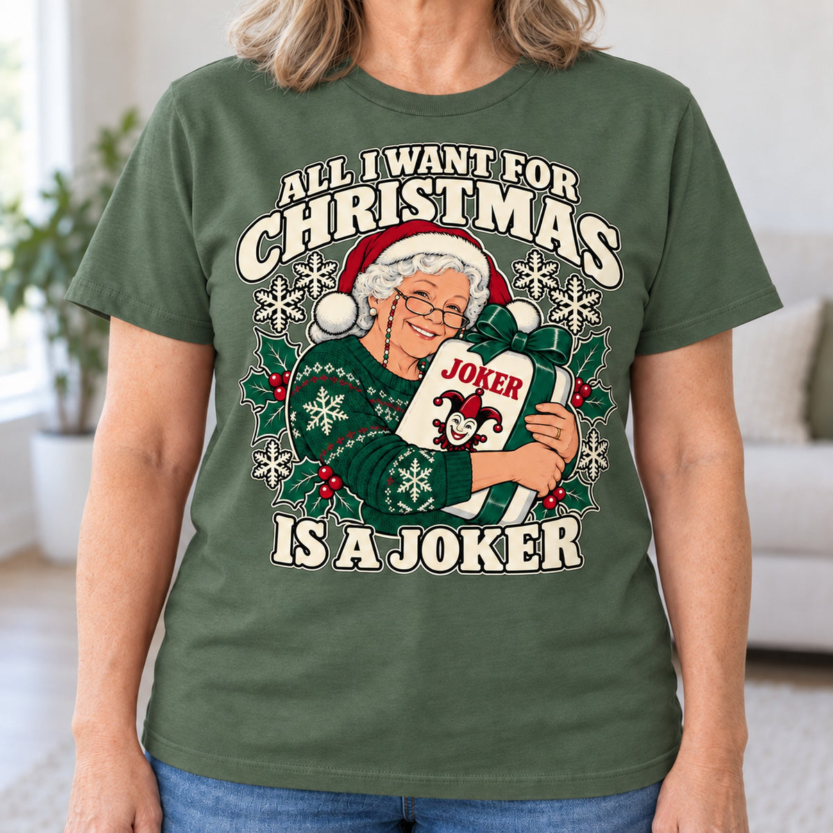 All I Want For Christmas mahjong T-shirt in Military Green, close-up of the print, worn by Susan. Susan is 5′5″ and wears her usual size L. [bb c=military-green r=close]