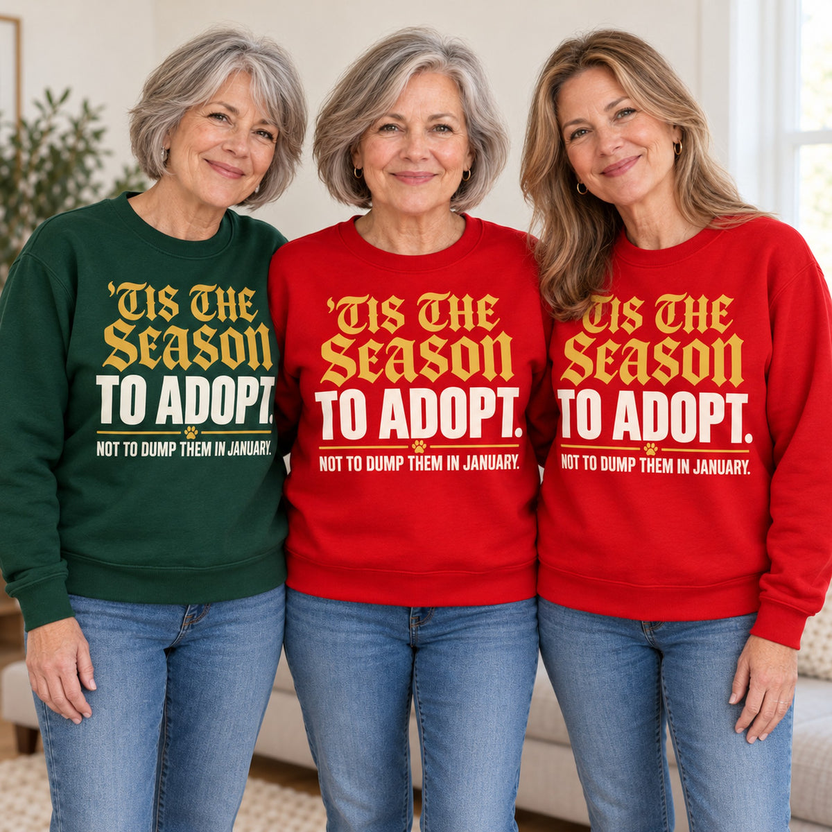 'Tis The Season To Adopt sweatshirt worn by three friends. Friends are wearing M, L and XL. [bb c=all r=friends]