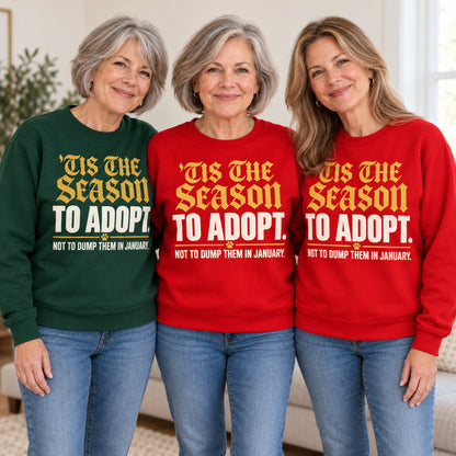 'Tis The Season To Adopt sweatshirt worn by three friends. Friends are wearing M, L and XL. [bb c=all r=friends]