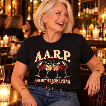 A.A.R.P. And Another Round, Please T-shirt in Black, close-up of the print, worn by Linda. Linda is 5′5″ and wears her usual size L. [bb c=black r=close]