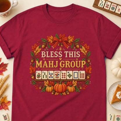 Bless This Mahj Group mahjong T-shirt in Cardinal Red, laid flat. [bb c=cardinal-red r=flat]