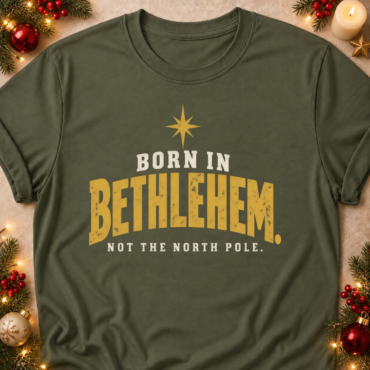 Not The North Pole faith T-shirt in Military Green, laid flat. [bb c=military-green r=flat]