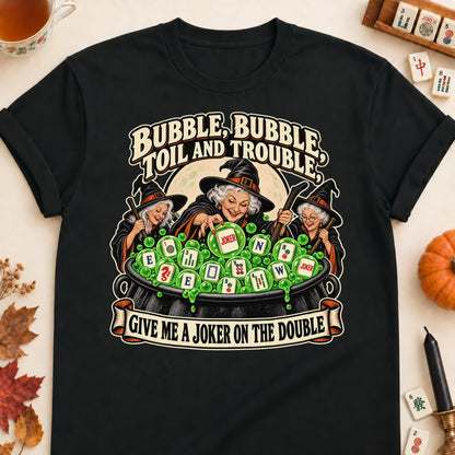 Toil And Trouble mahjong T-shirt in Black, laid flat. [bb c=black r=flat]