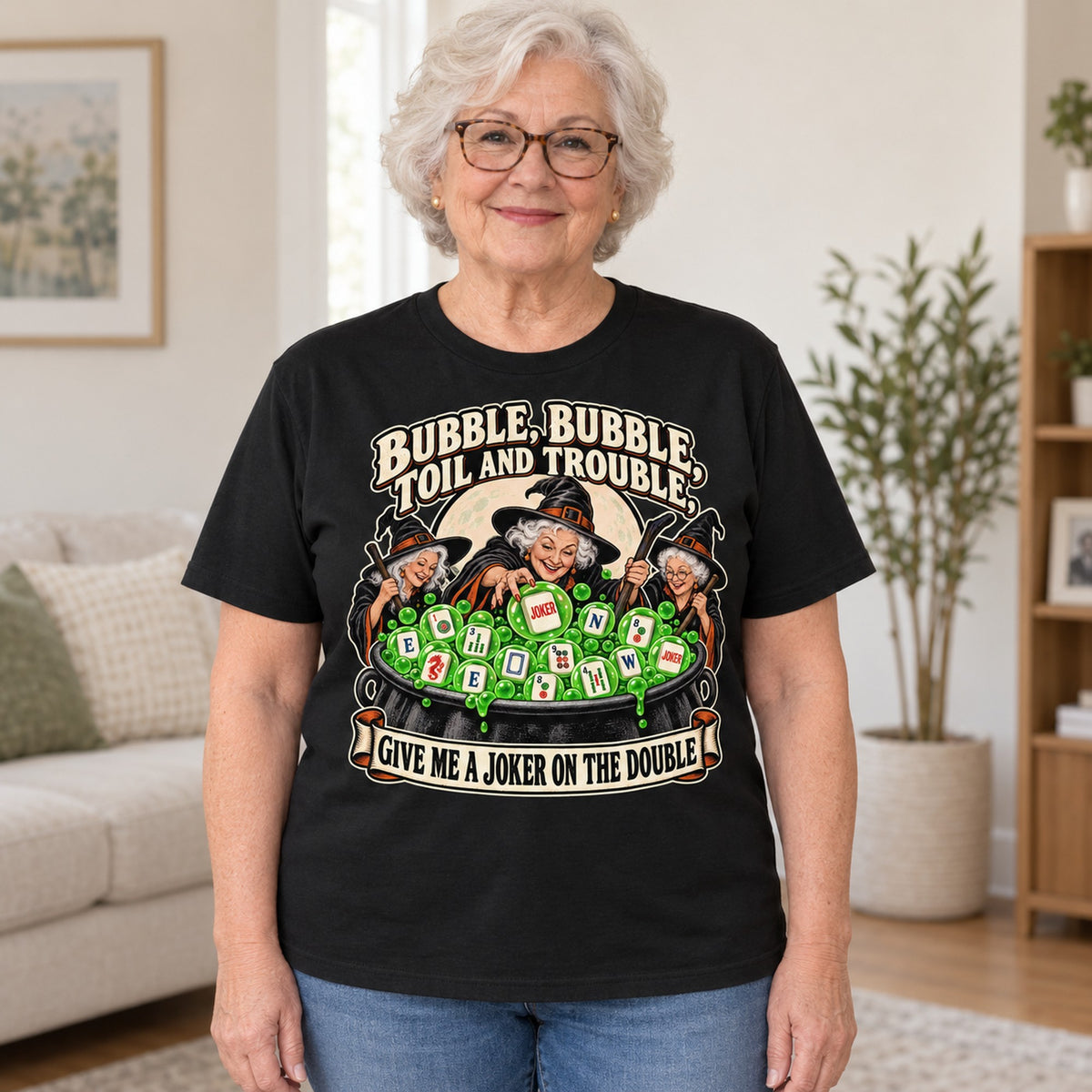 Toil And Trouble mahjong T-shirt in Black, worn by Joyce. Joyce is 5′5″ and wears her usual size L. [bb c=black r=hero]