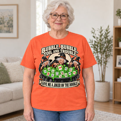Toil And Trouble mahjong T-shirt in Orange, worn by Joyce. Joyce is 5′5″ and wears her usual size L. [bb c=orange r=hero]