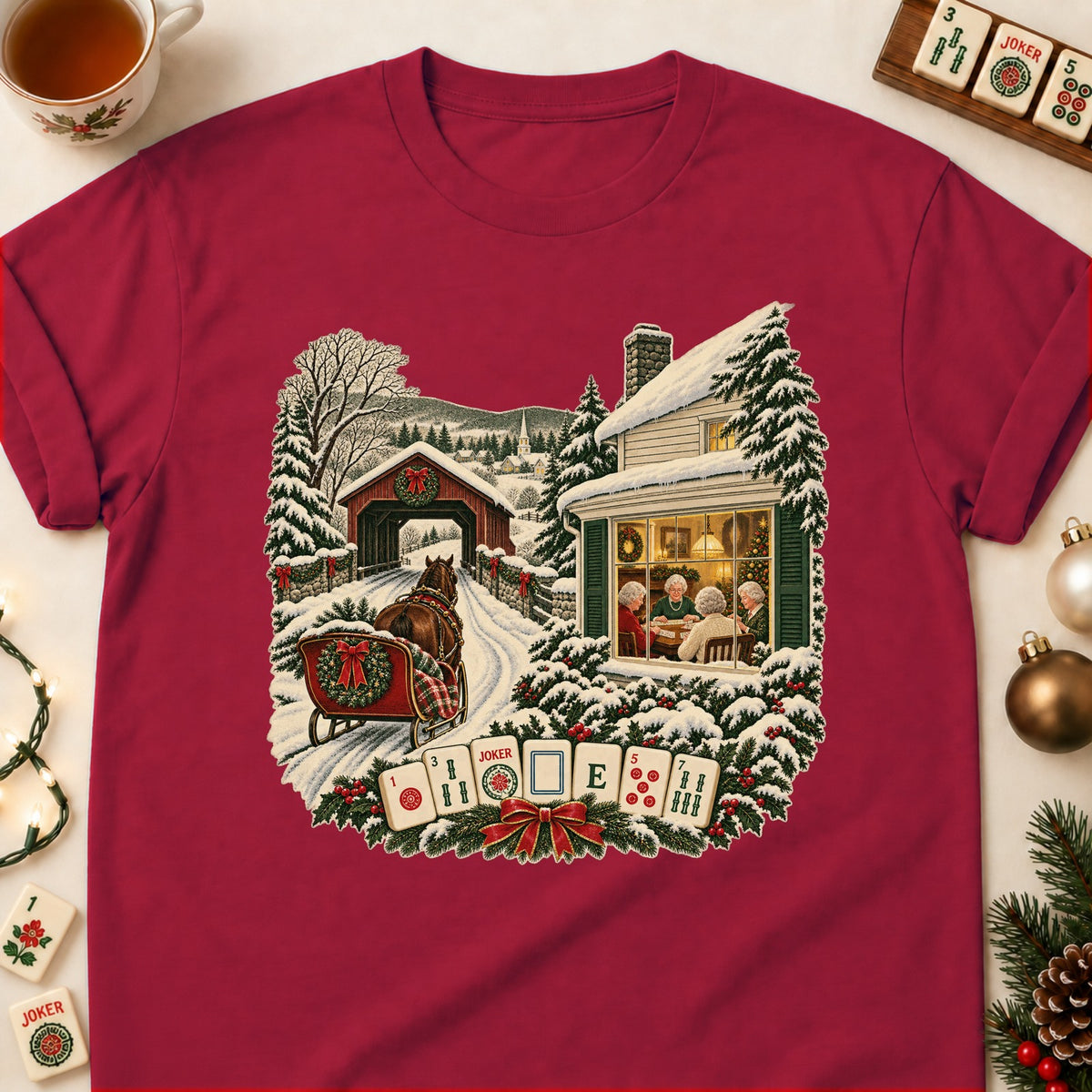 Christmas village mahjong T-shirt in Cardinal Red, laid flat. [bb c=cardinal-red r=flat]