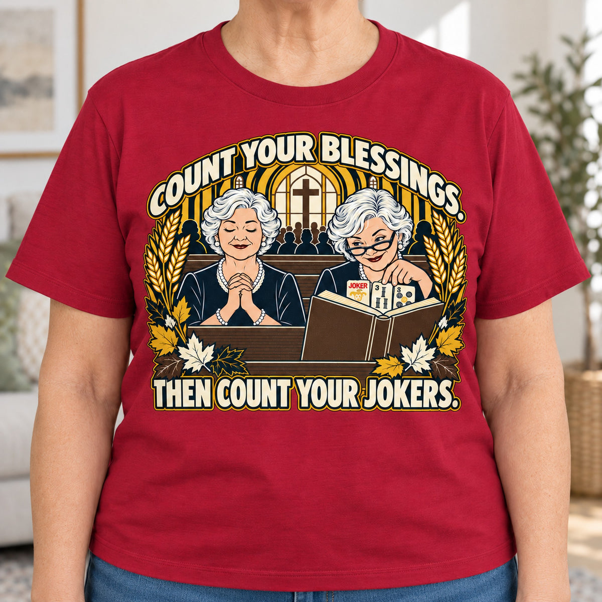 Count Your Blessings mahjong T-shirt in Cardinal Red, close-up of the print, worn by Nancy. Nancy is 5′5″ and wears her usual size L. [bb c=cardinal-red r=close]