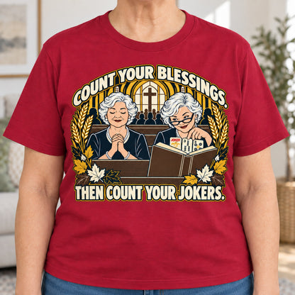 Count Your Blessings mahjong T-shirt in Cardinal Red, close-up of the print, worn by Nancy. Nancy is 5′5″ and wears her usual size L. [bb c=cardinal-red r=close]