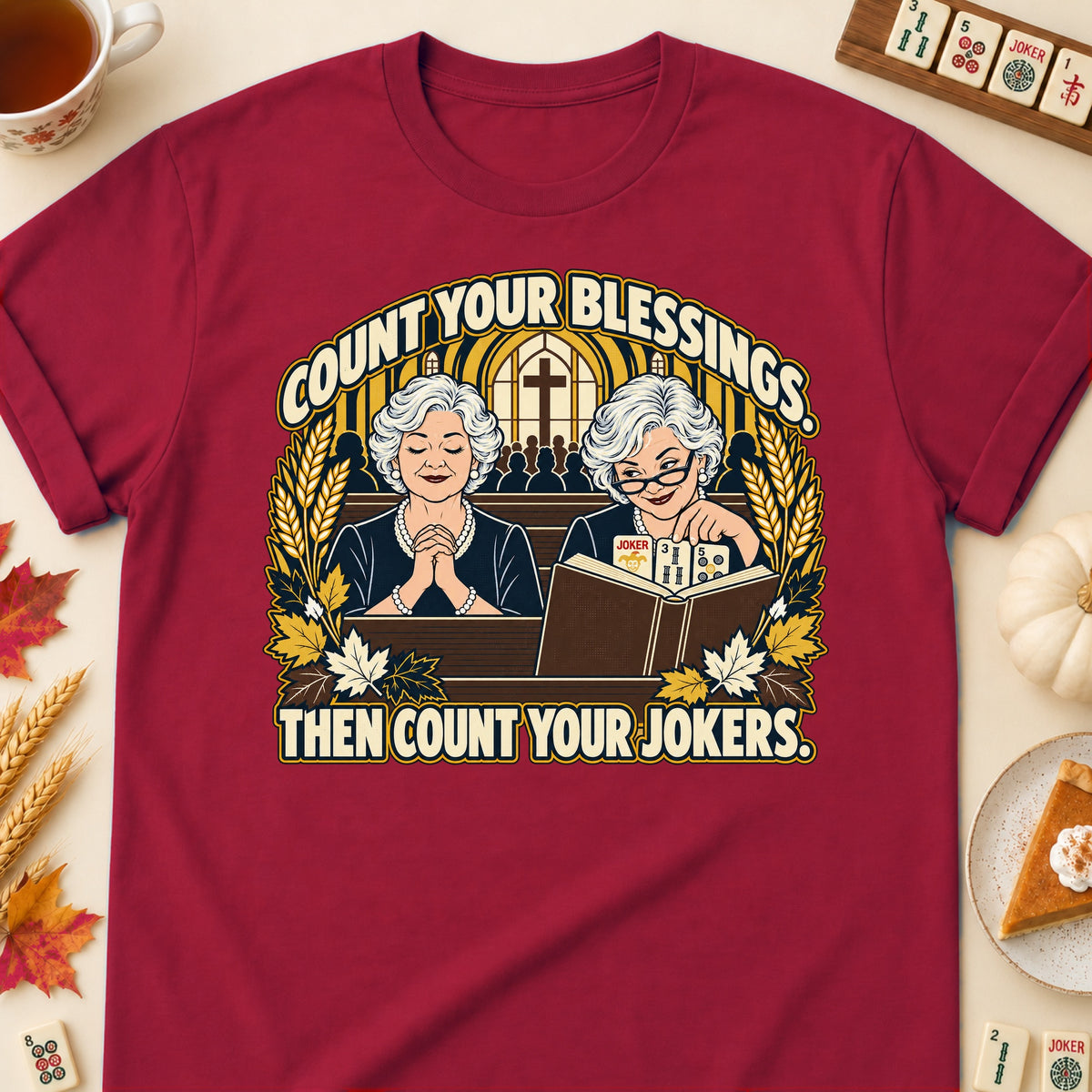 Count Your Blessings mahjong T-shirt in Cardinal Red, laid flat. [bb c=cardinal-red r=flat]