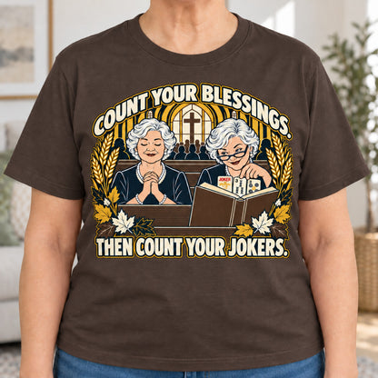 Count Your Blessings mahjong T-shirt in Dark Chocolate, close-up of the print, worn by Nancy. Nancy is 5′5″ and wears her usual size L. [bb c=dark-chocolate r=close]