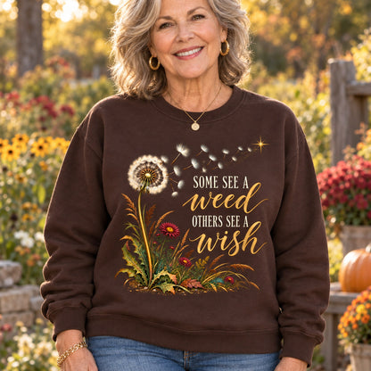 Some See A Weed sweatshirt in Dark Chocolate, close-up of the print, worn by Joan. Joan is 5′4″ and wears her usual size L. [bb c=dark-chocolate r=close]