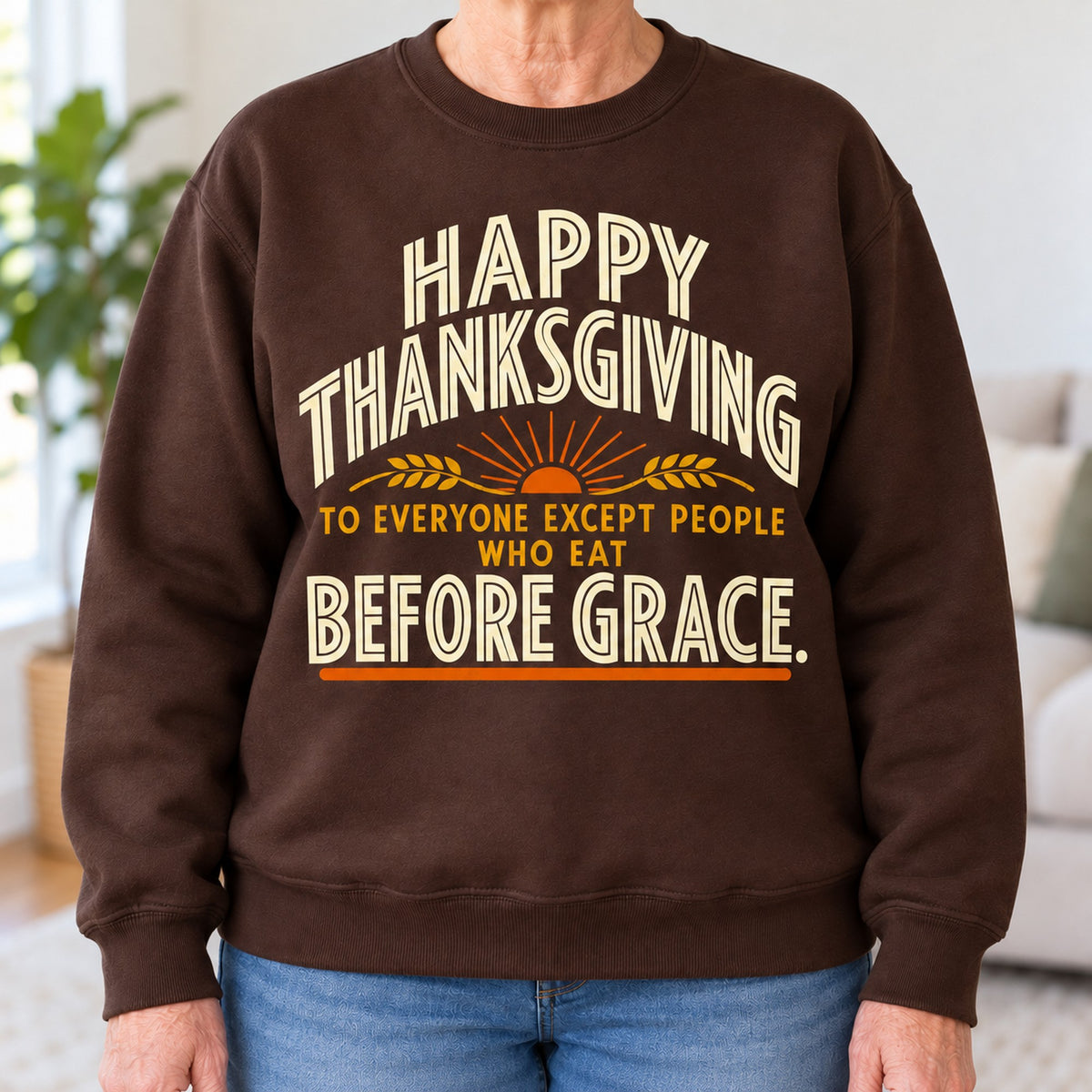 Happy Thanksgiving Before Grace sweatshirt in Dark Chocolate, close-up of the print, worn by Helen. Helen is 5′5″ and wears her usual size M. [bb c=dark-chocolate r=close]