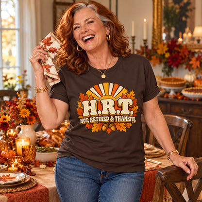H.R.T. Hot, Retired & Thankful T-shirt in Dark Chocolate, worn by Patricia. Patricia is 5′5″ and wears her usual size L. [bb c=dark-chocolate r=hero]