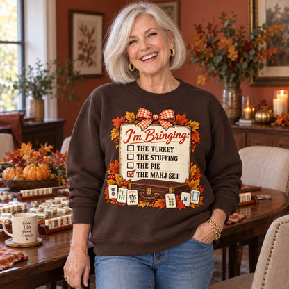 I'm Bringing The Mahj Set sweatshirt in Dark Chocolate, worn by Elaine. Elaine is 5′5″ and wears her usual size M. [bb c=dark-chocolate r=hero]