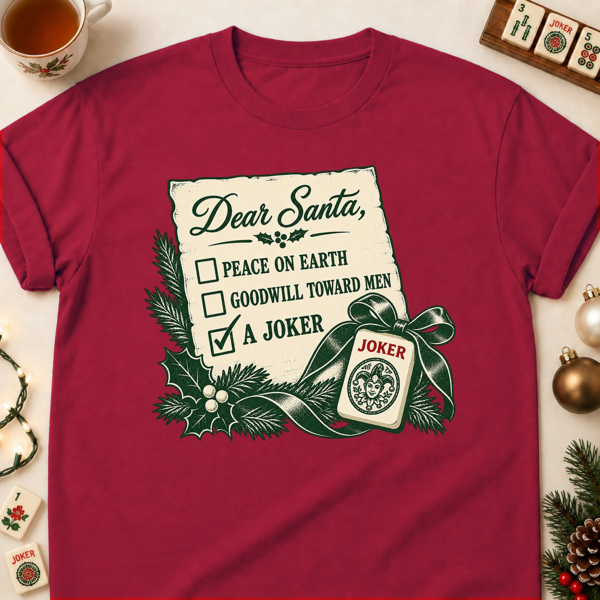 Dear Santa mahjong T-shirt in Cardinal Red, laid flat. [bb c=cardinal-red r=flat]
