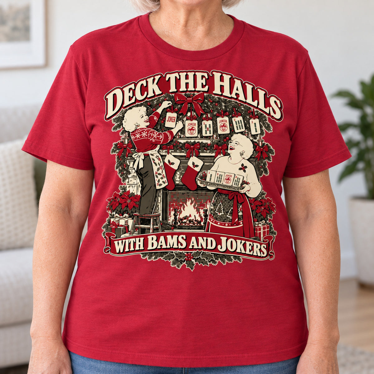 Deck The Halls With Bams And Jokers mahjong T-shirt in Cardinal Red, close-up of the print, worn by Joan. Joan is 5′5″ and wears her usual size L. [bb c=cardinal-red r=close]