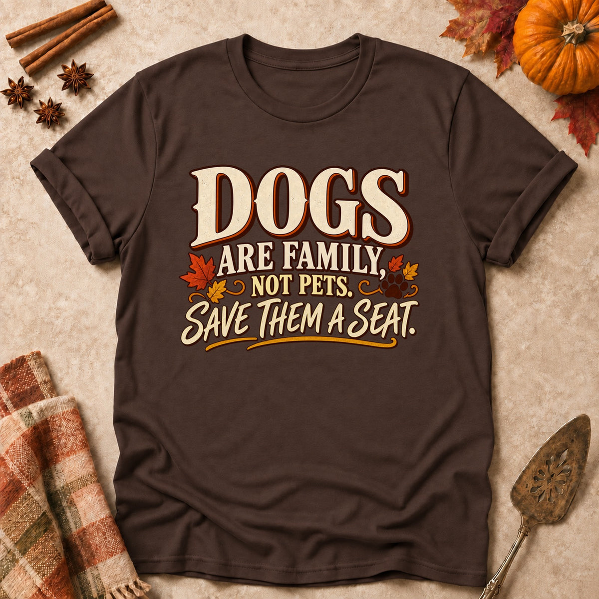 Dogs Are Family dog mom T-shirt in Dark Chocolate, laid flat. [bb c=dark-chocolate r=flat]