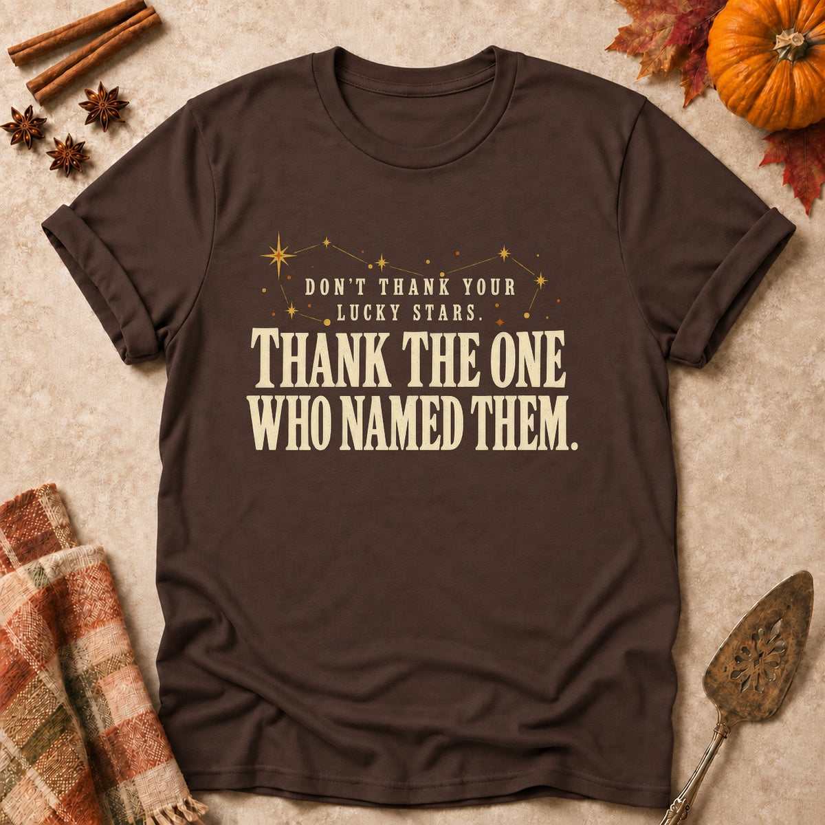 Thank The One Who Named Them faith T-shirt in Dark Chocolate, laid flat. [bb c=dark-chocolate r=flat]