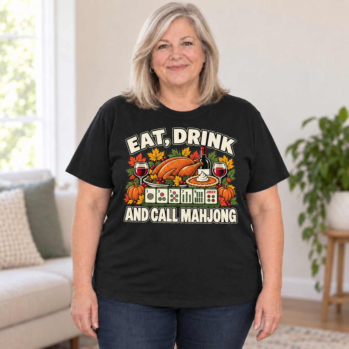 Eat, Drink And Call Mahjong T-shirt in Black, worn by Debra. Debra is 5′4″ and wears her usual size 2XL. [bb c=black r=body2]