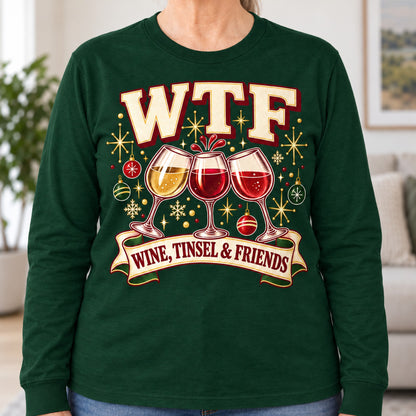 WTF Wine, Tinsel & Friends long sleeve in Forest Green, close-up of the print, worn by Peggy. Peggy is 5′6″ and wears her usual size L. [bb c=forest-green r=close]