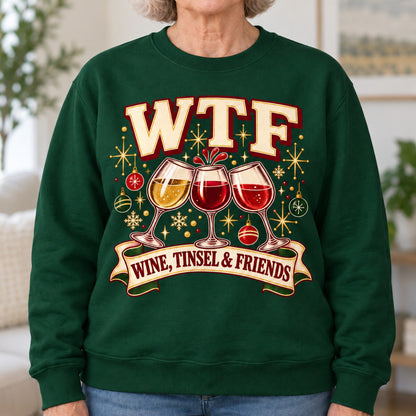 WTF Wine, Tinsel & Friends sweatshirt in Forest Green, close-up of the print, worn by Kathy. Kathy is 5′5″ and wears her usual size L. [bb c=forest-green r=close]