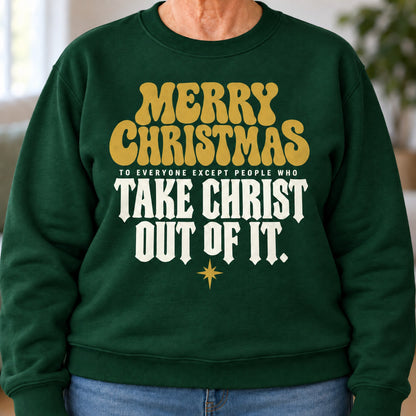 Merry Christmas Take Christ Out Of It sweatshirt in Forest Green, close-up of the print, worn by Barbara. Barbara is 5′4″ and wears her usual size L. [bb c=forest-green r=close]
