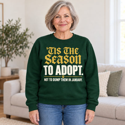 'Tis The Season To Adopt sweatshirt in Forest Green, worn by Carol. Carol is 5′4″ and wears her usual size L. [bb c=forest-green r=hero]