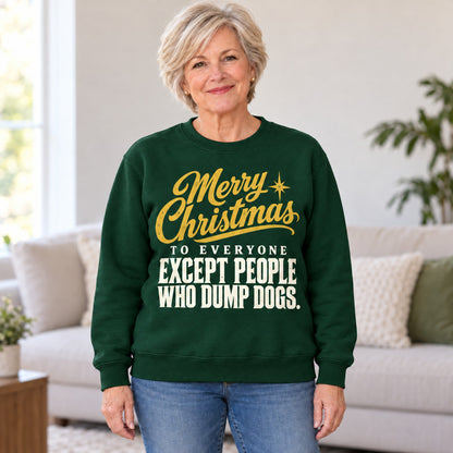 Merry Christmas Except People Who Dump Dogs sweatshirt in Forest Green, worn by Nancy. Nancy is 5′5″ and wears her usual size L. [bb c=forest-green r=hero]