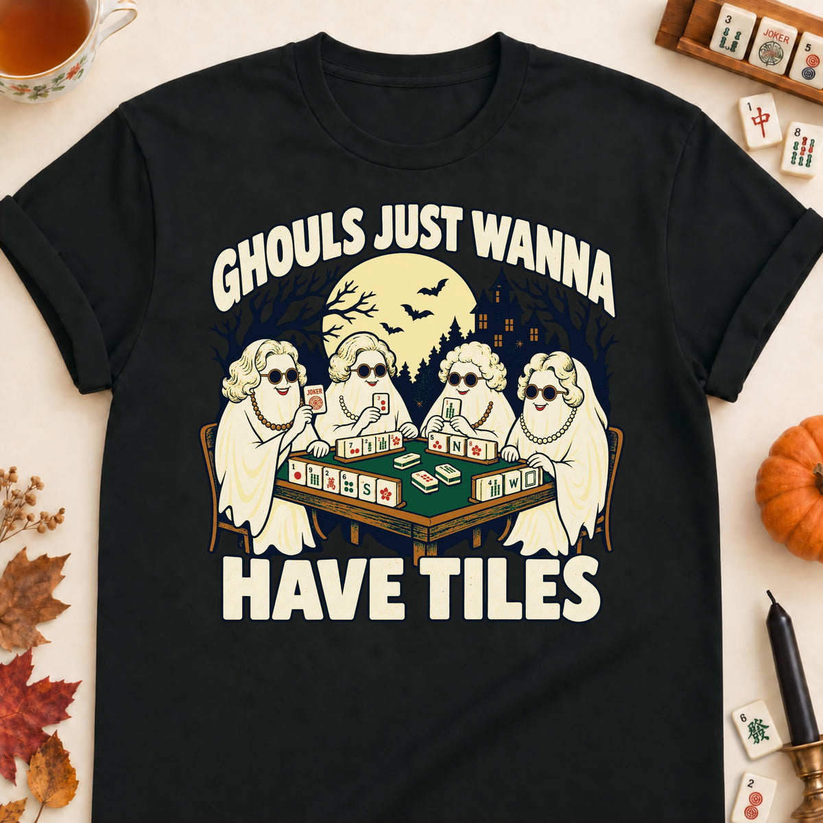 Ghouls Just Wanna Have Tiles mahjong T-shirt in Black, laid flat. [bb c=black r=flat]