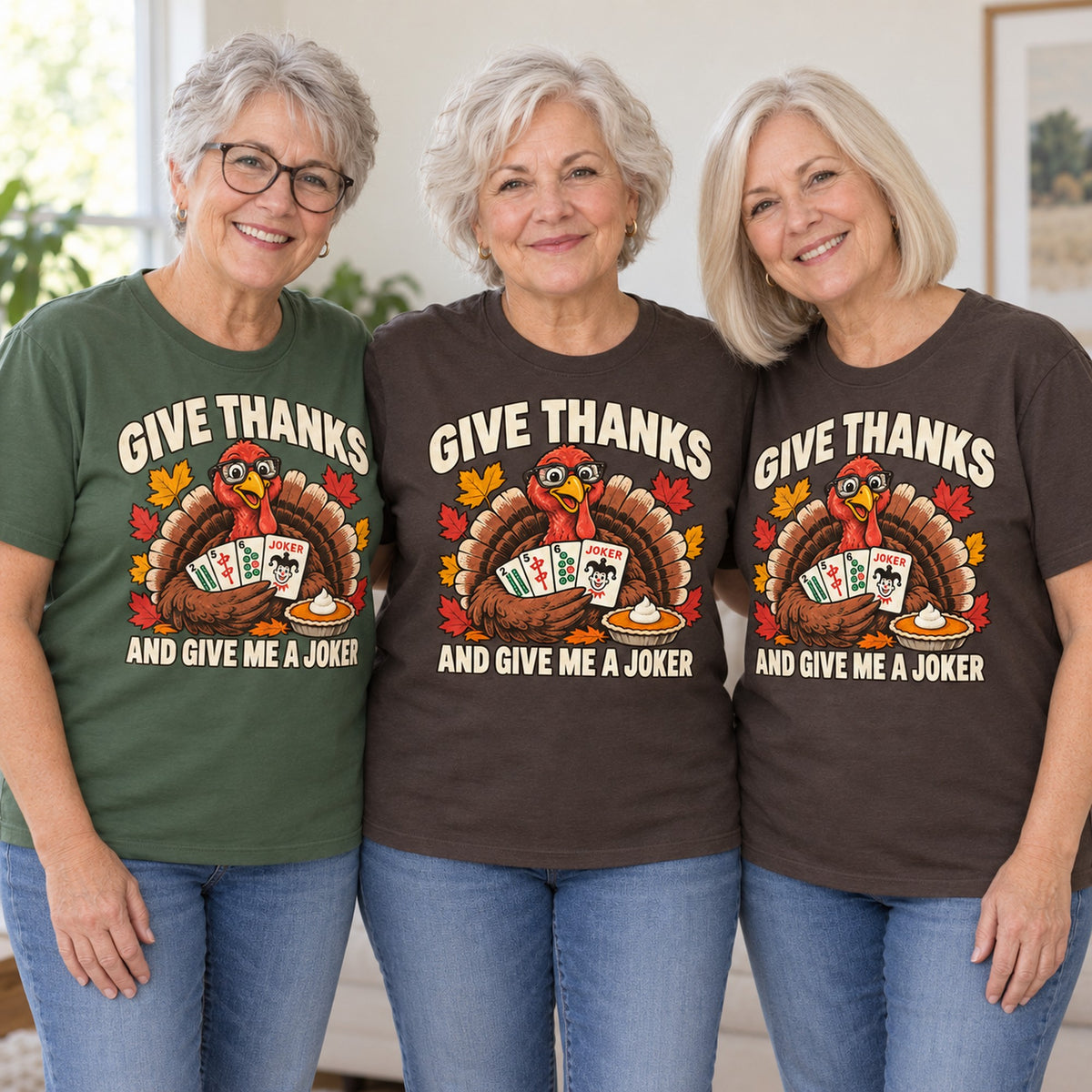 Give Thanks mahjong T-shirt worn by three friends. Friends are wearing M, L and XL. [bb c=all r=friends]