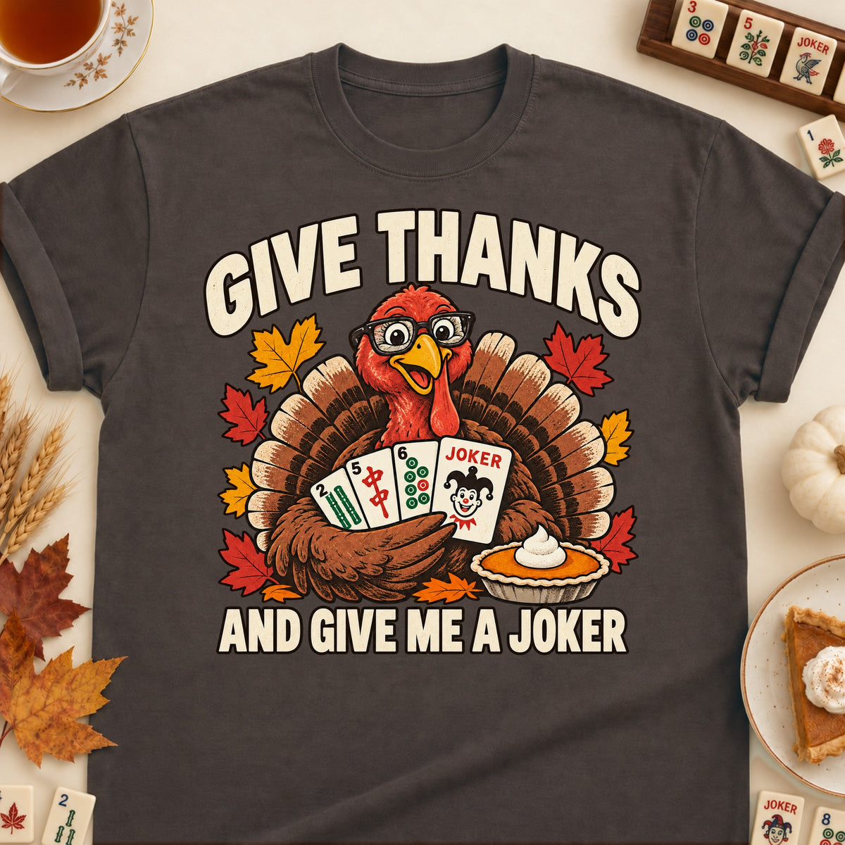 Give Thanks mahjong T-shirt in Dark Chocolate, laid flat. [bb c=dark-chocolate r=flat]
