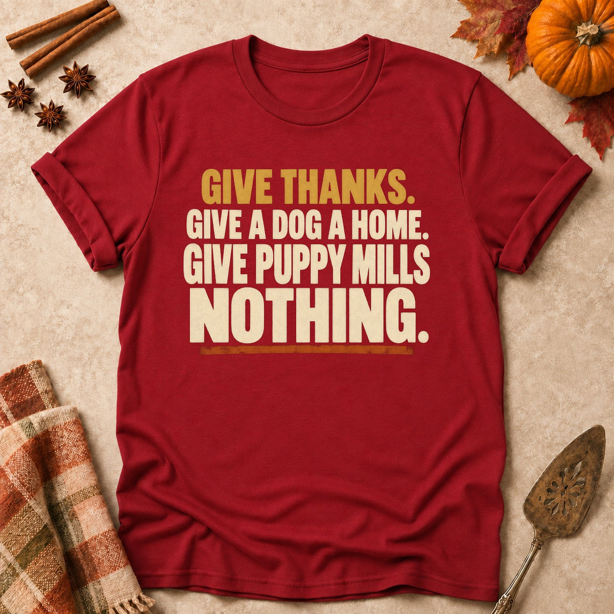 Give Puppy Mills Nothing dog mom T-shirt in Cardinal Red, laid flat. [bb c=cardinal-red r=flat]