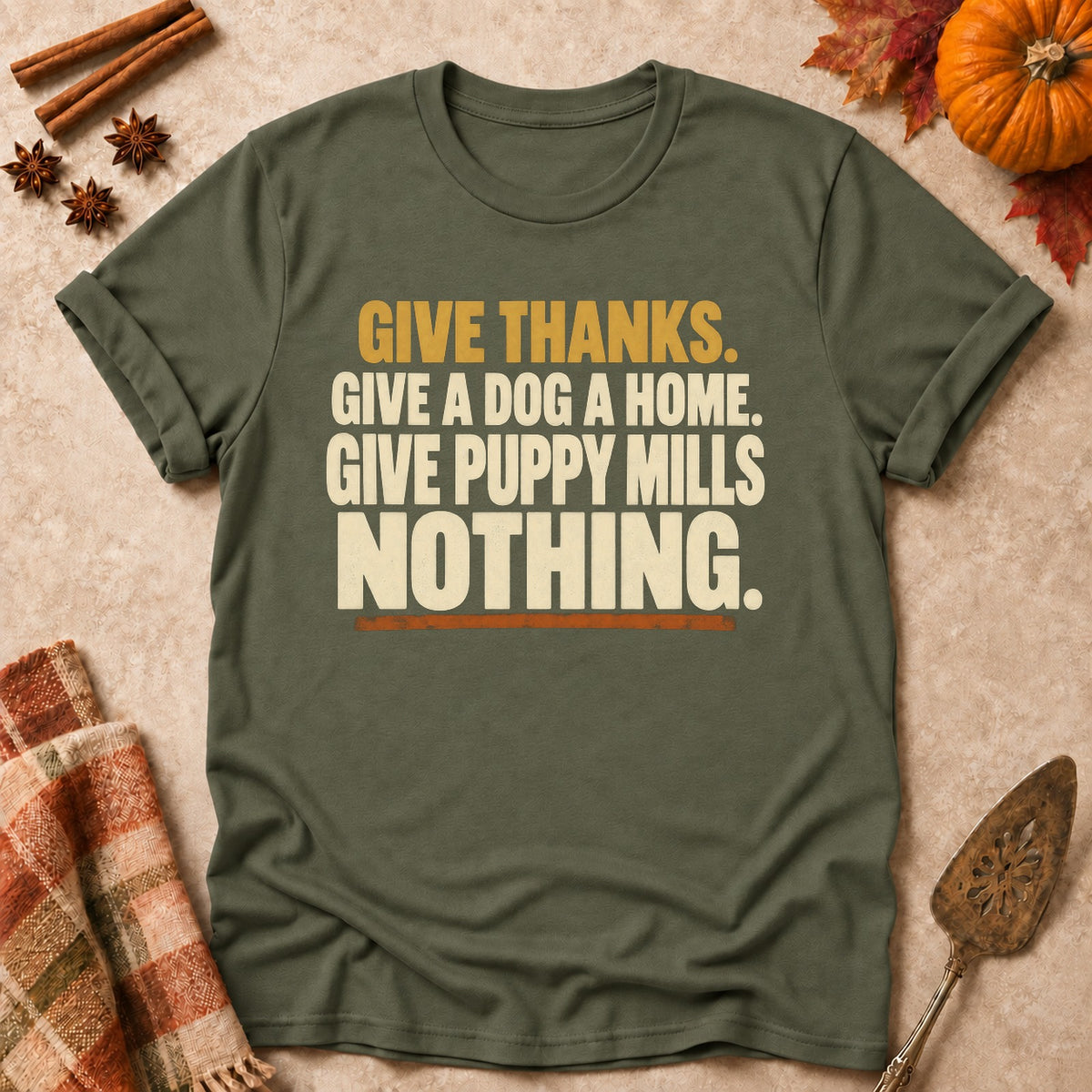 Give Puppy Mills Nothing dog mom T-shirt in Military Green, laid flat. [bb c=military-green r=flat]