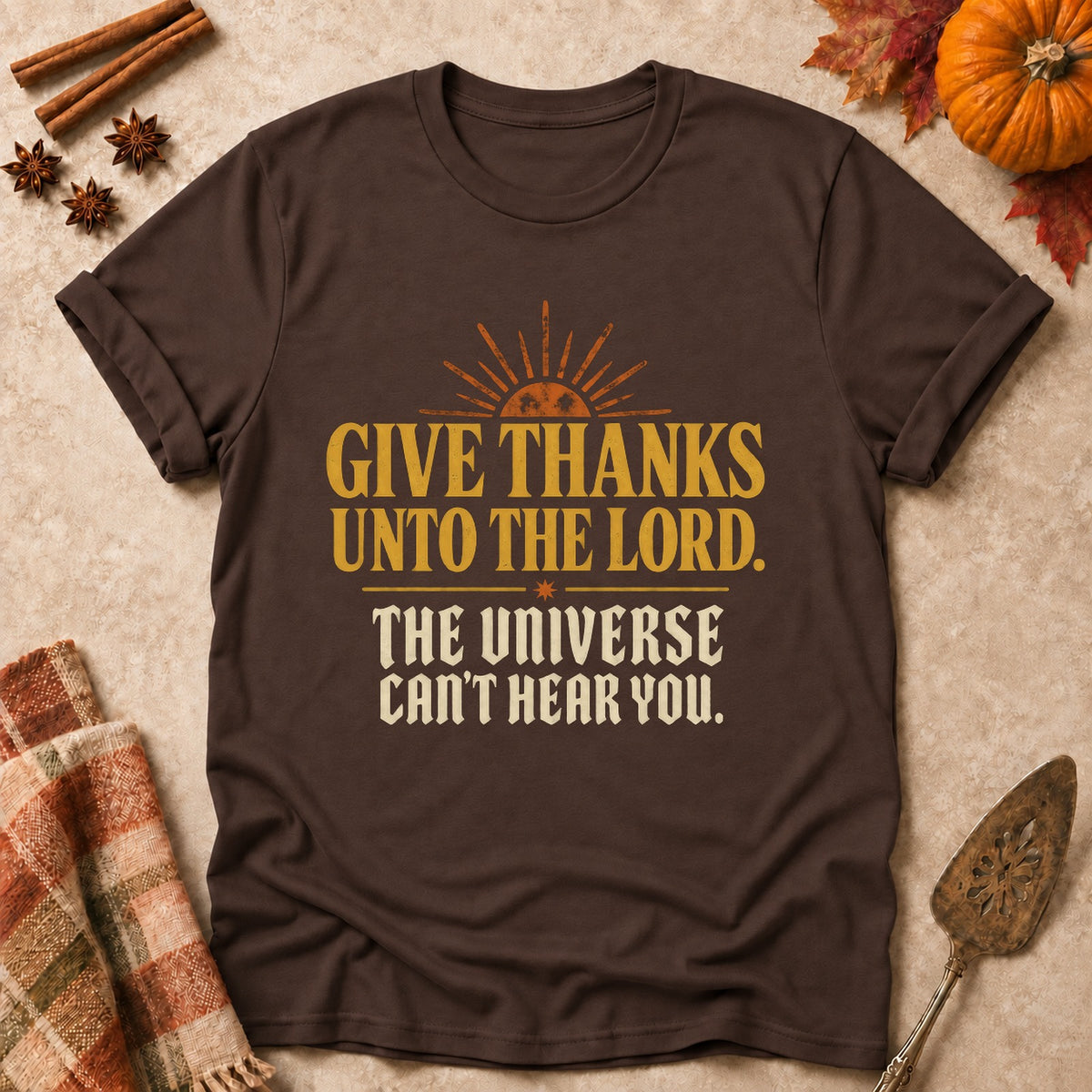 The Universe Can't Hear You faith T-shirt in Dark Chocolate, laid flat. [bb c=dark-chocolate r=flat]