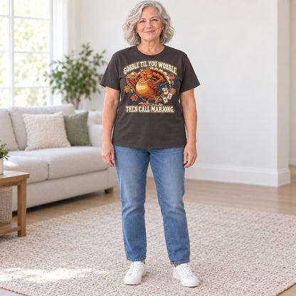 Gobble Til You Wobble mahjong T-shirt in Dark Chocolate, full length, worn by Donna. Donna is 5′5″ and wears her usual size L. [bb c=dark-chocolate r=fit]