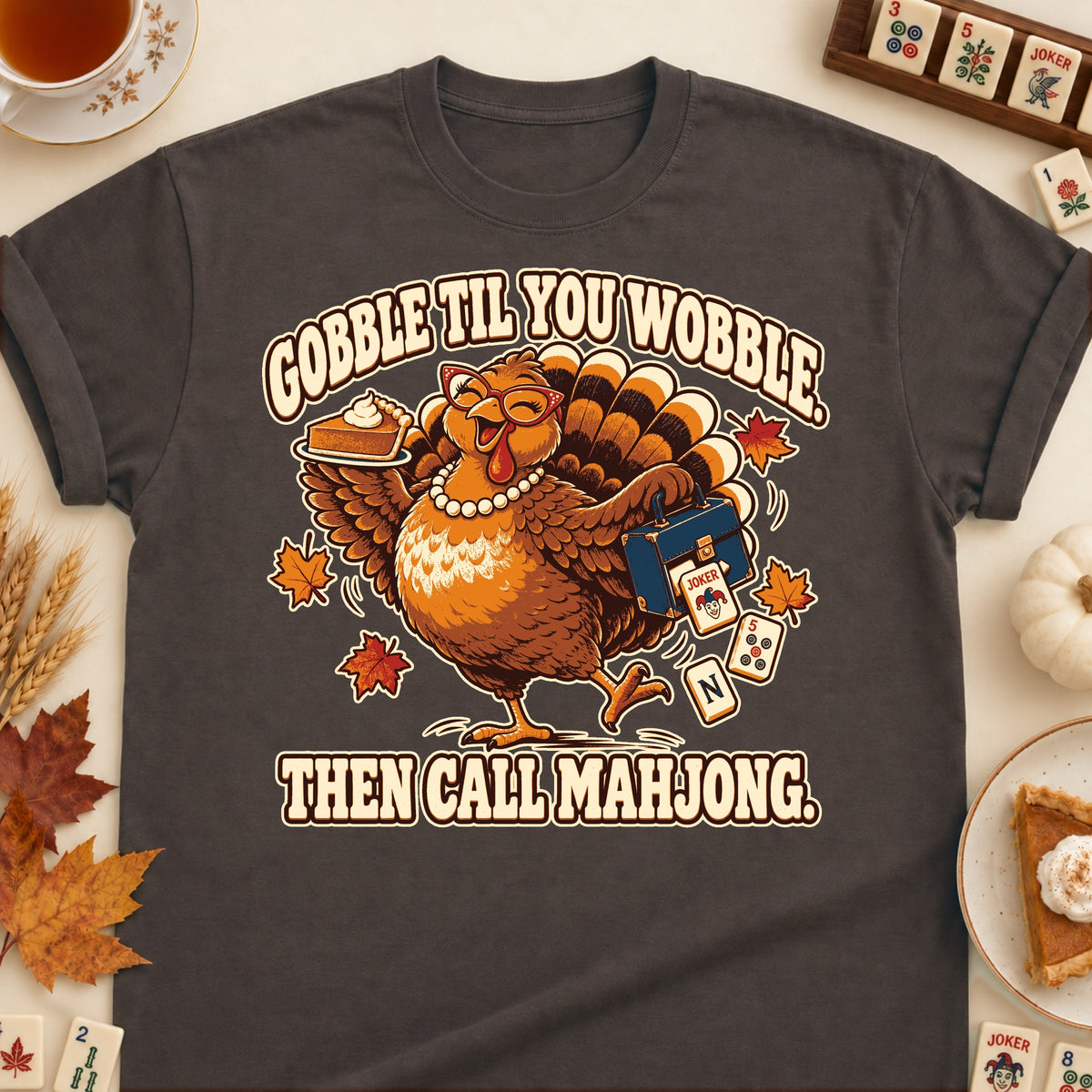 Gobble Til You Wobble mahjong T-shirt in Dark Chocolate, laid flat. [bb c=dark-chocolate r=flat]