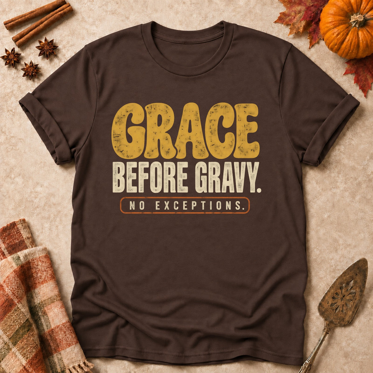 Grace Before Gravy faith T-shirt in Dark Chocolate, laid flat. [bb c=dark-chocolate r=flat]
