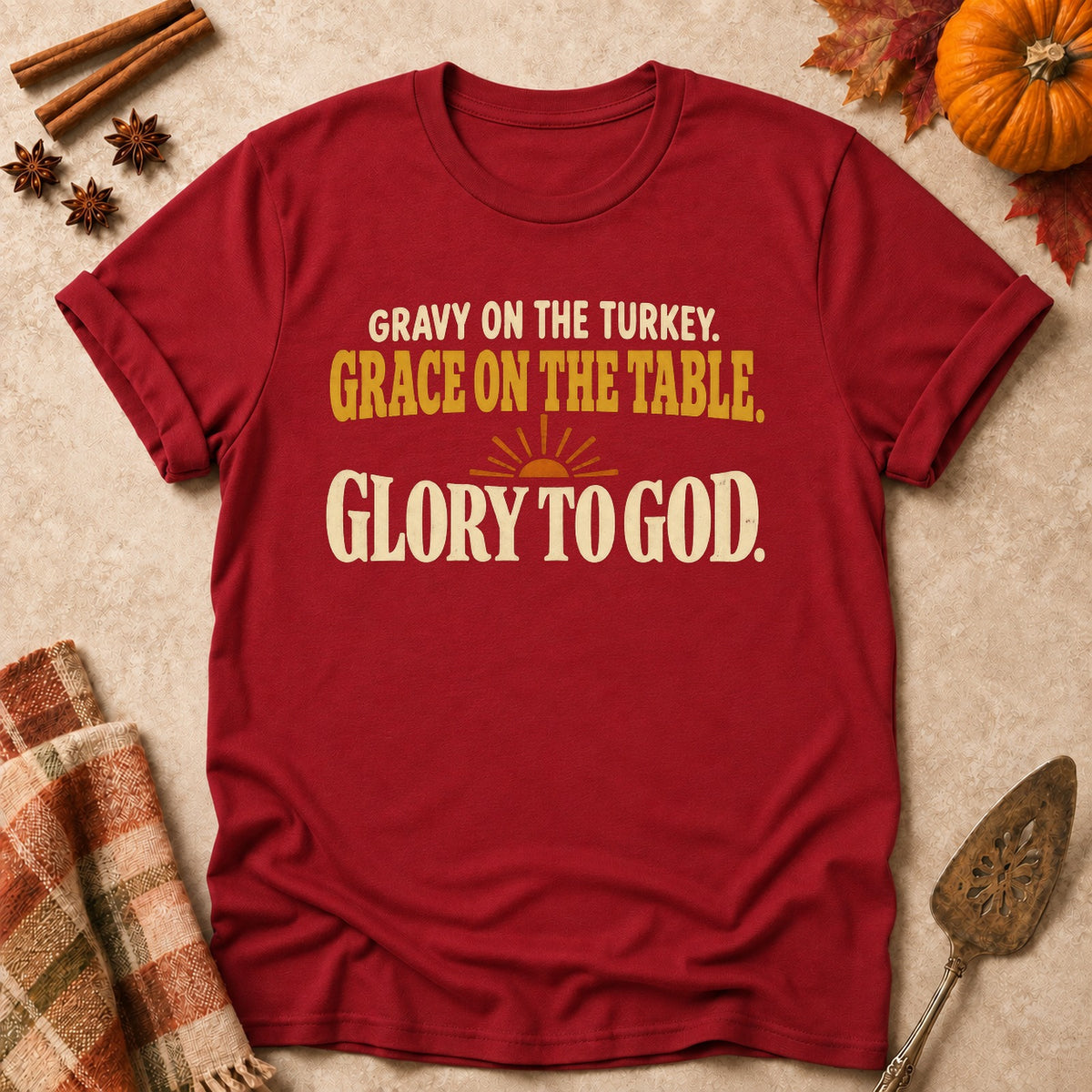 Glory To God faith T-shirt in Cardinal Red, laid flat. [bb c=cardinal-red r=flat]