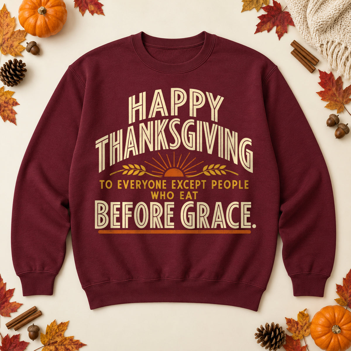 Happy Thanksgiving Before Grace sweatshirt in Maroon, laid flat. [bb c=maroon r=flat]