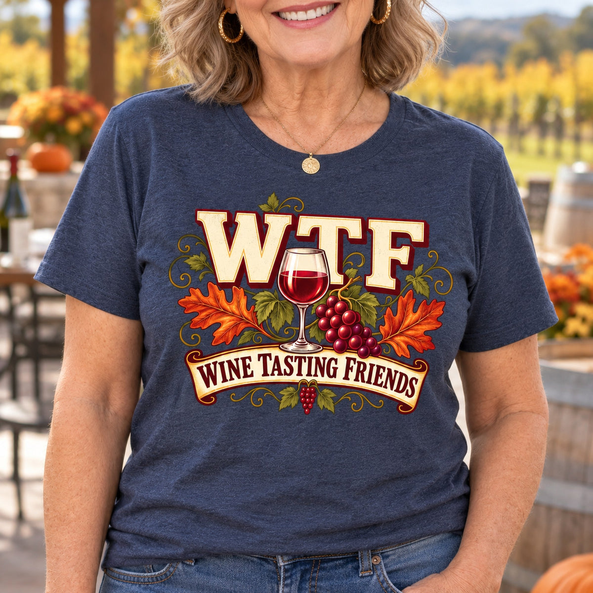 WTF Wine Tasting Friends T-shirt in Heather Navy, close-up of the print, worn by Susan. Susan is 5′4″ and wears her usual size L. [bb c=heather-navy r=close]