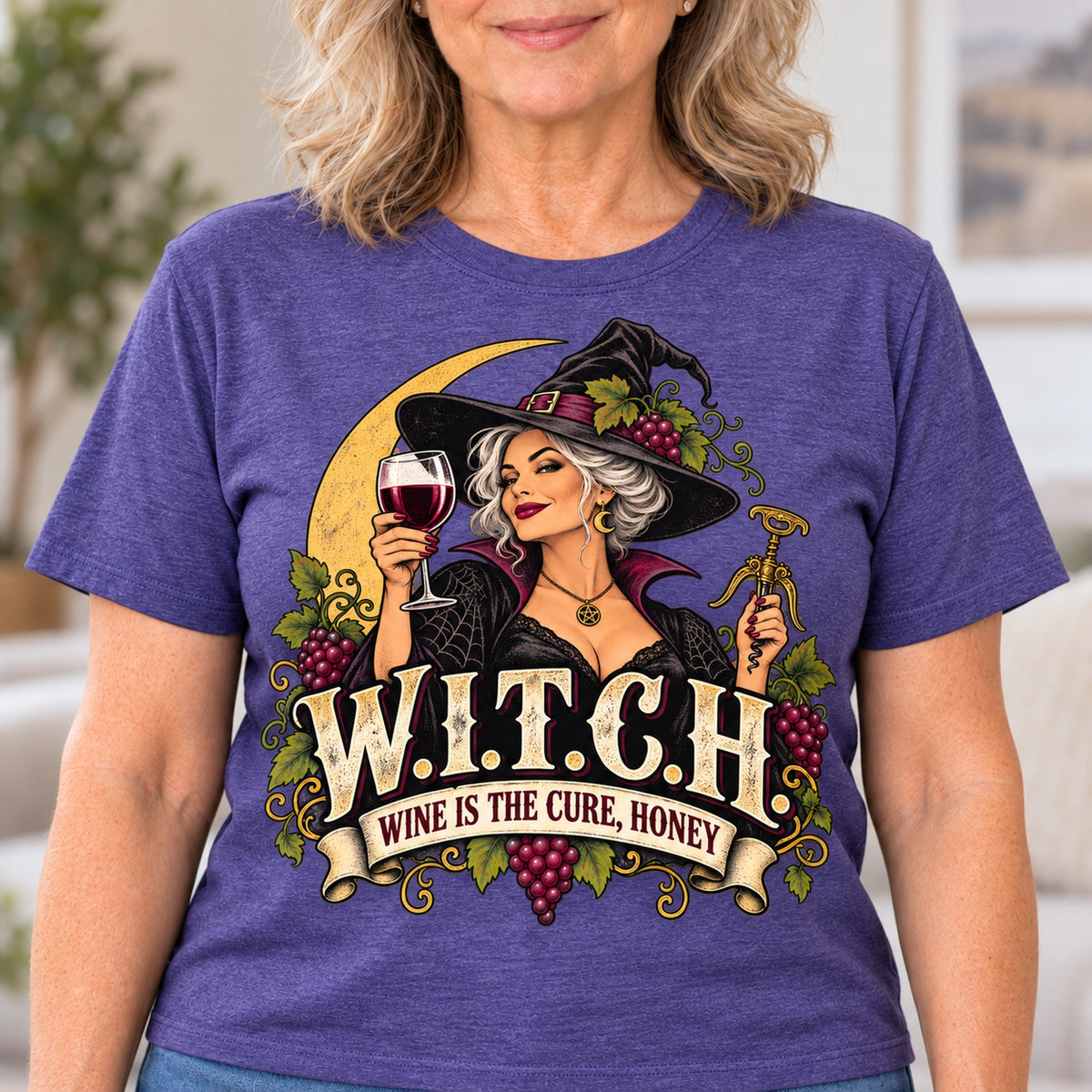 W.I.T.C.H. T-shirt in Heather Purple, close-up of the print, worn by Diane. Diane is 5′5″ and wears her usual size L. [bb c=heather-purple r=close]
