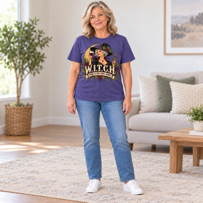 W.I.T.C.H. T-shirt in Heather Purple, full length, worn by Diane. Diane is 5′5″ and wears her usual size L. [bb c=heather-purple r=fit]