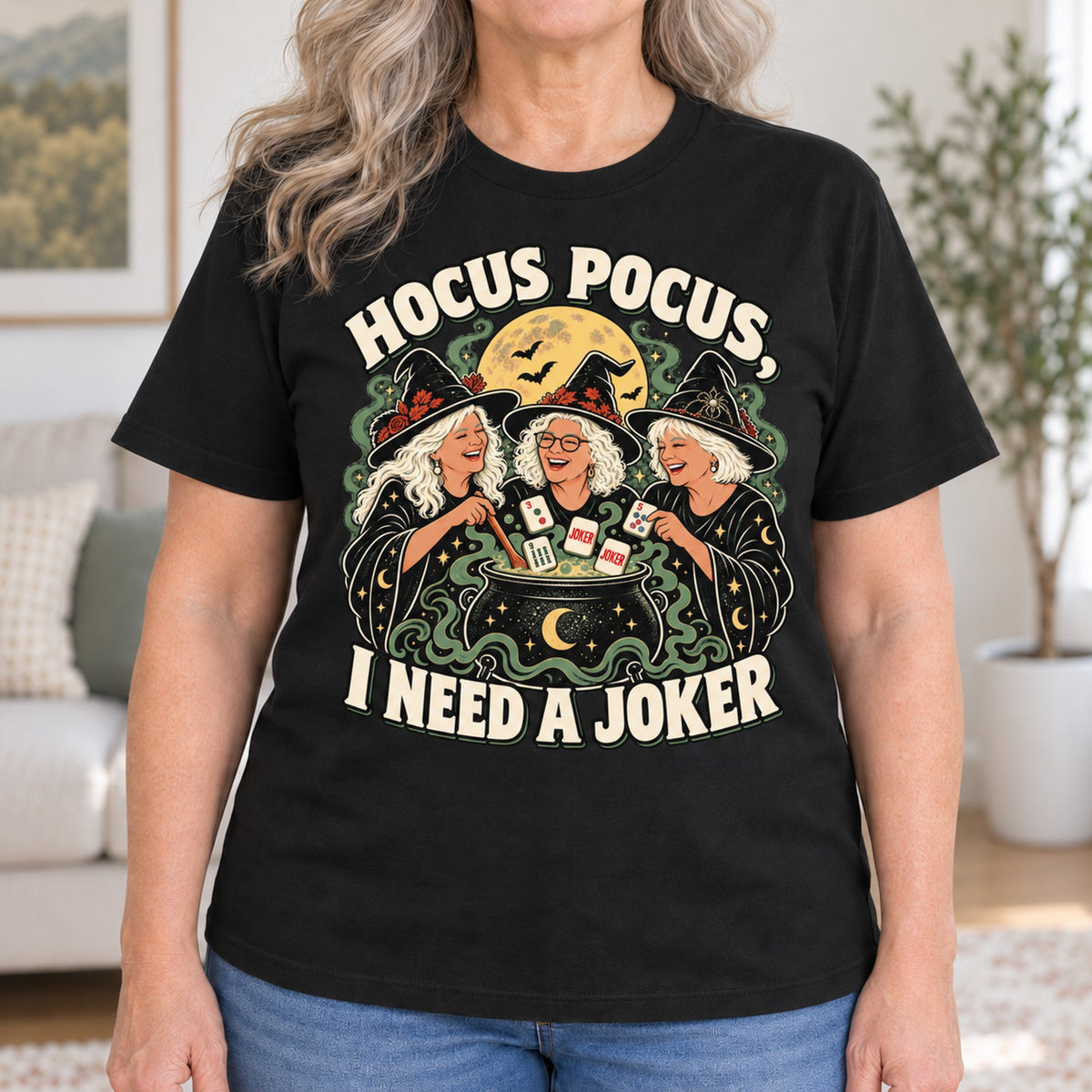 Hocus Pocus mahjong T-shirt in Black, close-up of the print, worn by Sandra. Sandra is 5′5″ and wears her usual size L. [bb c=black r=close]