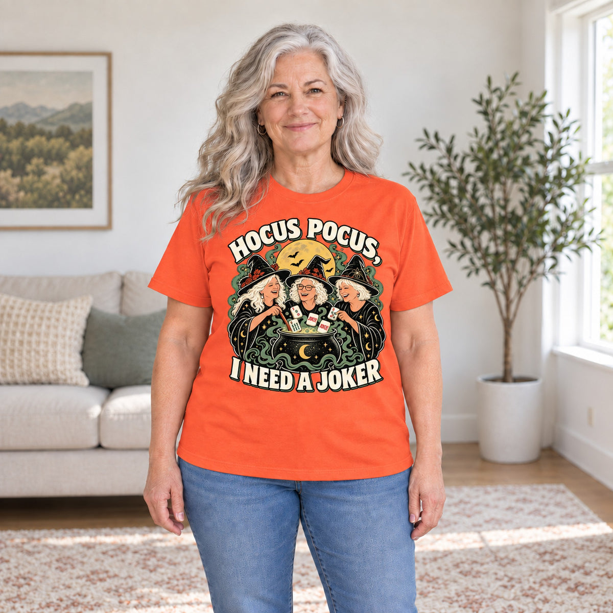 Hocus Pocus mahjong T-shirt in Orange, worn by Sandra. Sandra is 5′5″ and wears her usual size L. [bb c=orange r=hero]