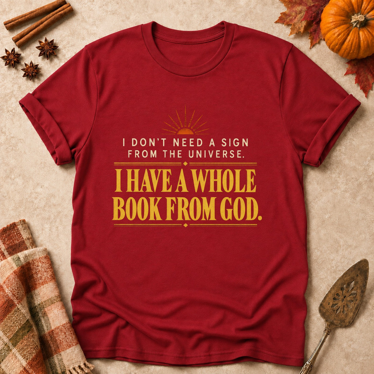 A Whole Book From God faith T-shirt in Cardinal Red, laid flat. [bb c=cardinal-red r=flat]