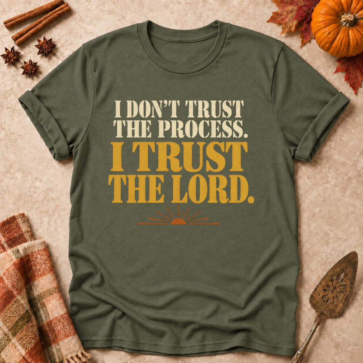 I Trust The Lord faith T-shirt in Military Green, laid flat. [bb c=military-green r=flat]