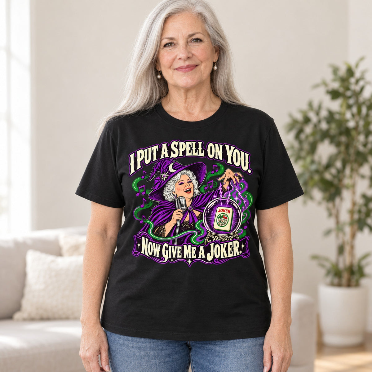 I Put A Spell On You mahjong T-shirt in Black, worn by Marilyn. Marilyn is 5′5″ and wears her usual size L. [bb c=black r=hero]